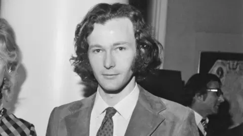 Getty Images Black and white image of a young Philip Pullman.