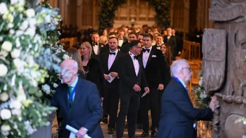 Getty Images Guests leave the wedding of Adam Peaty and Holly Ramsay at Bath Abbey on December 27, 2025 in Bath, England