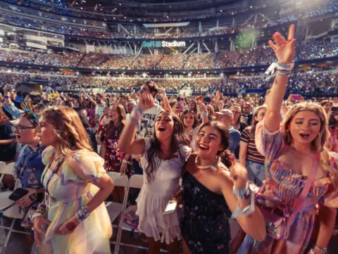 Getty Images Taylor Swift fans watch the Eras tour