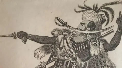 Listen To This Story! O Smith as Three-Fingered Jack. Theatre card from 1813, published for J Fairburn. It shows a black illustration on sepia-coloured paper of a man in a large hat, holding a cutlass in his mouth, with his right arm outstretched holding a gun and his left arm upraised. 