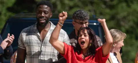 Ross and Netty standing outside the Traitors castle